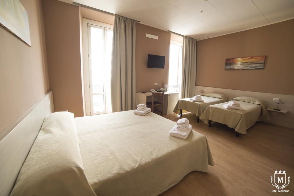 Hotel Moderno Леко Екстериор снимка